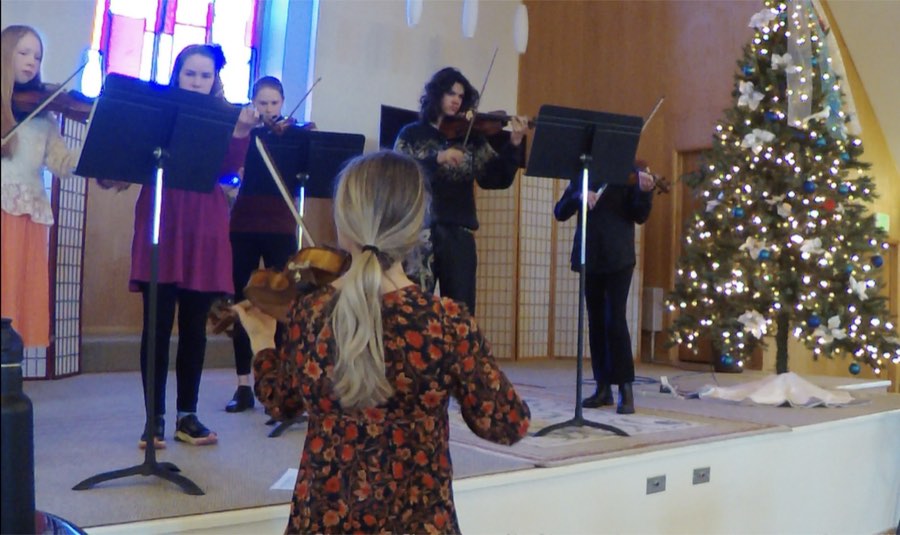 Students performing in a holiday recital